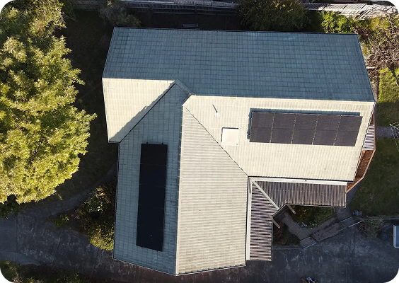 Aerial view of a Kingston roof with solar panels and a skylight